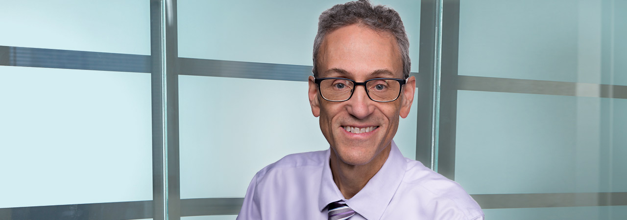 Headshot of David R. Heckadon, a US patent attorney, trademark attorney, and lawyer