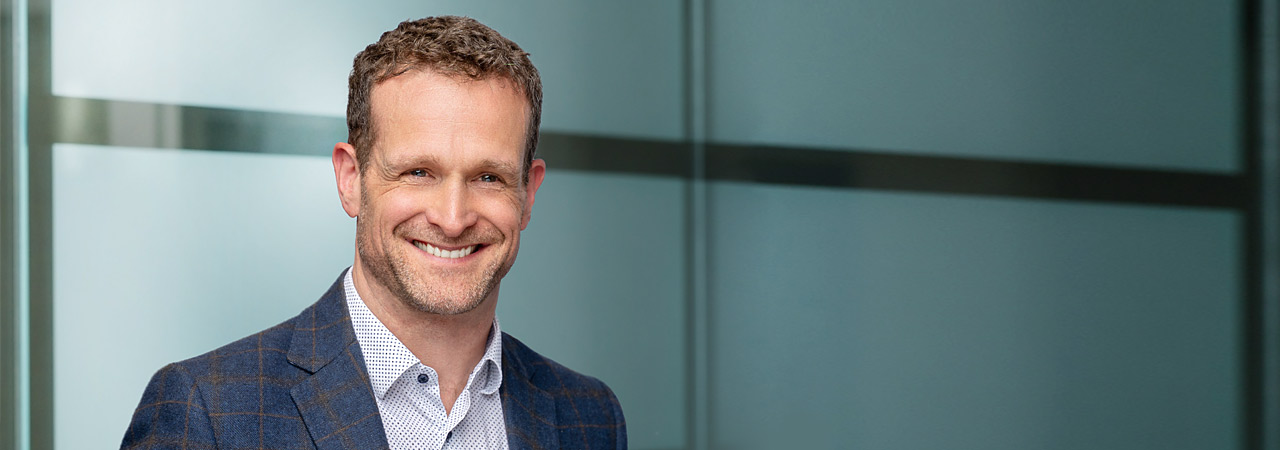 Photograph of T. Andrew Currier, a registered patent agent, trademark agent, lawyer, and co-founder of PCK Intellectual Property