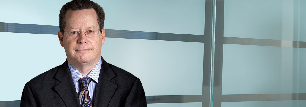Headshot of Gregory C. Ludlow, a trademark agent and lawyer